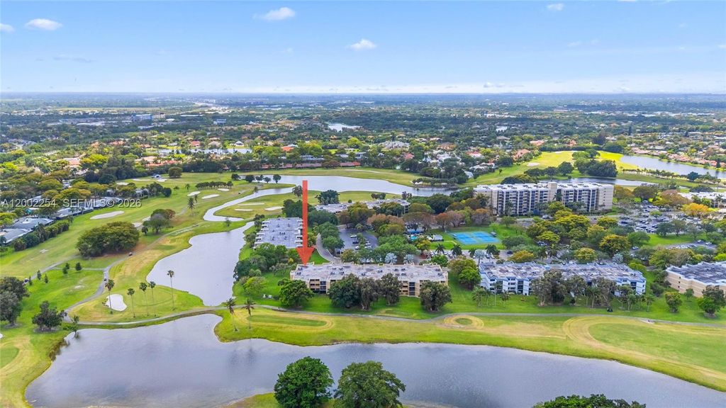 Photo of 16175 Golf Club Rd #212, Weston, FL 33326 (MLS # A12002254)