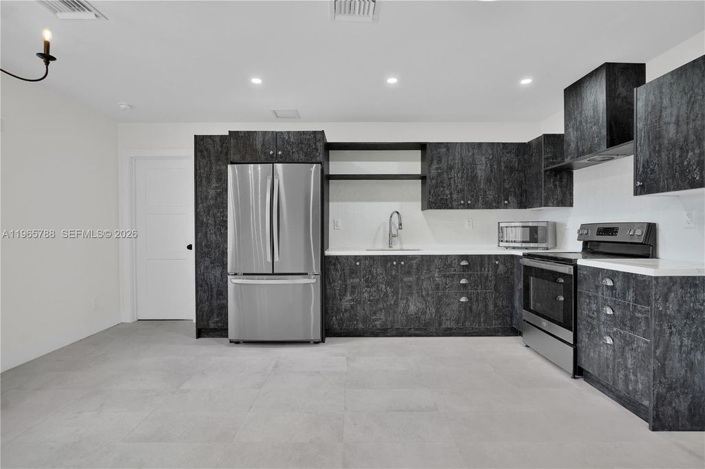 Photo of 5980 SW 40th Ave #C, Dania Beach, FL 33312 (MLS # A11965788)