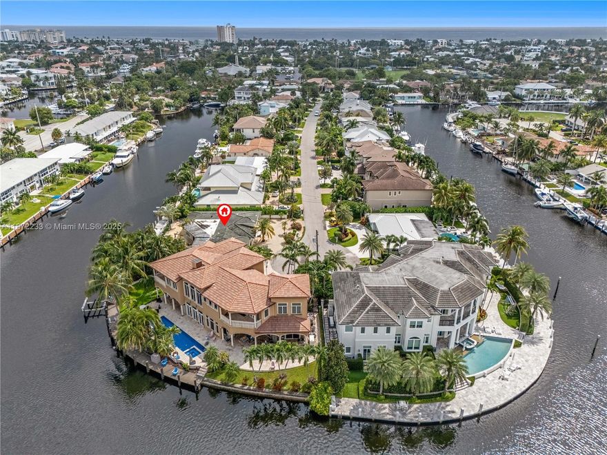 97 Feet Waterfront – No Fixed Bridges – Lighthouse Point Tear-Down
Unmatched opportunity on NE 35th Street: 97 feet of deep-water frontage with no fixed bridges and direct ocean access. Oversized ~9,939 sf lot with existing pool offers the perfect canvas for a luxury two-story custom home (3,500–4,000+ sf). Surrounding sales support new construction values of $3M–$4M+. The existing 1962 residence is sold as-is, land value only. This is a boater’s paradise location with a scarce supply. No contingencies.