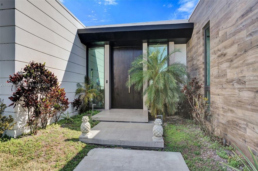 Ultra-modern architectural masterpiece built in 2020 in the Skylake/Aventura area. This stunning gated residence offers 5 en-suite bedrooms, 5 full baths and 2 half baths (powder room & cabana bath), set on a generous 14,455 SF lot.
Spectacular open floorplan with soaring 10-ft ceilings and floor-to-ceiling impact glass doors that flood the home with natural light. PGT impact windows throughout. The showstopping gourmet Veneta Cucine kosher double kitchen features dual Sub-Zero refrigerators, dual wall ovens, dual dishwashers, dual sinks, and gas stovetops, & Espresso Machine —  Wolf & Sub-Zero appliances — built for serious entertaining. Italian porcelain floors, Legrand fixtures, and motorized window treatments elevate every detail. A brand new roof (Dec 2025) with solar panels, Tesla batteries, Tesla car charger installed and storage shed, ensure superior storm resilience and energy independence. Seamless indoor/outdoor living flows to an expansive terrace and resort-style heated pool — the ultimate South Florida lifestyle.
A true turn-key luxury offering in one of Miami-Dade's most desirable neighborhoods.