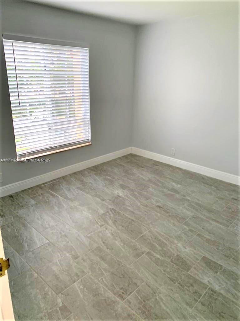 DORAL GARDENS II CONDO - Residential Lease