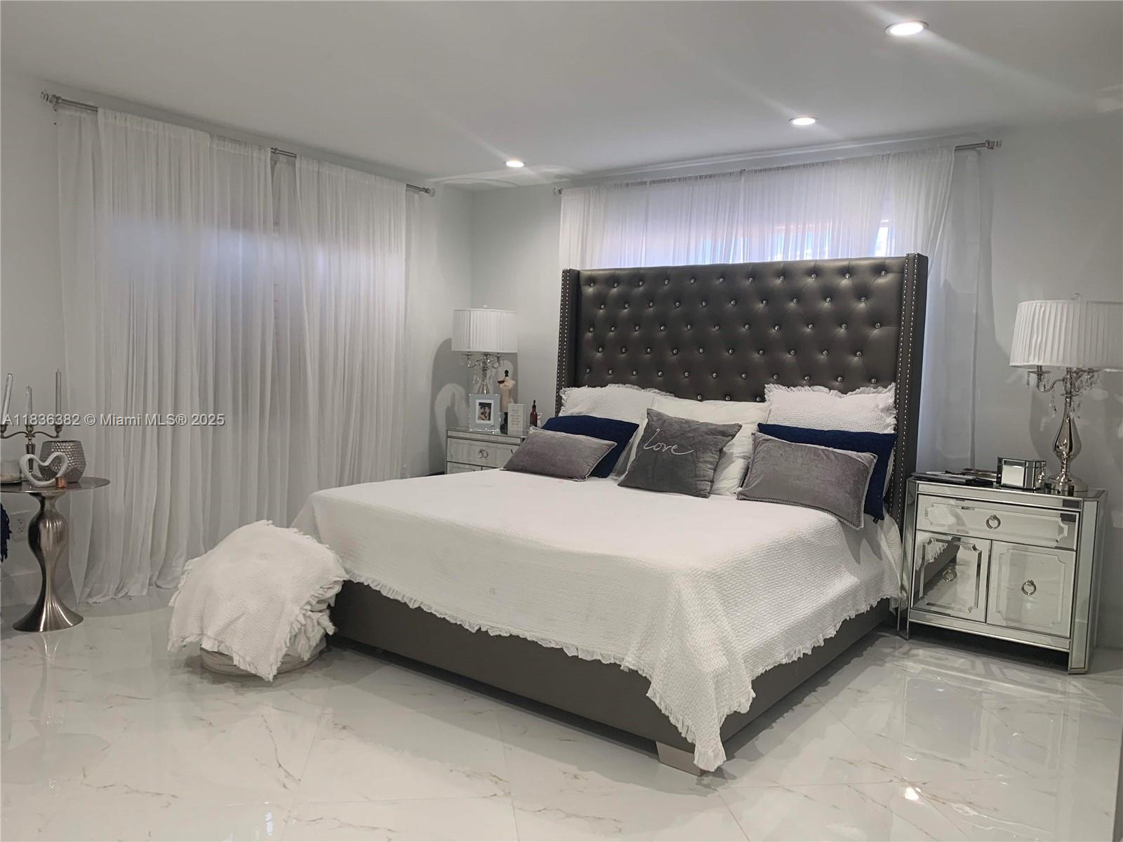 The perfect blend of luxury and comfort in this 4-bed, 3-bath home & a converted garage , ideal for a home office or playroom and is air-conditioned. Kitchen features sleek wood kitchen cabinets and elegant granite countertops. All impact windows ensure safety and energy efficiency. White porcelain tile flooring throughout. Your outdoor oasis awaits with 11,000 sq/ft includes a pool & a an outdoor kitchen, w/ sink, stove and stone countertops. Fully gated yard, with a separate gate to divide the yard from the pool area. The yard can accommodate a large 40+ ft. boat or RV, with an RV hookup and sewer access ready for your convenience. Located in Kendall area, Winston park. Call listing agent for more information