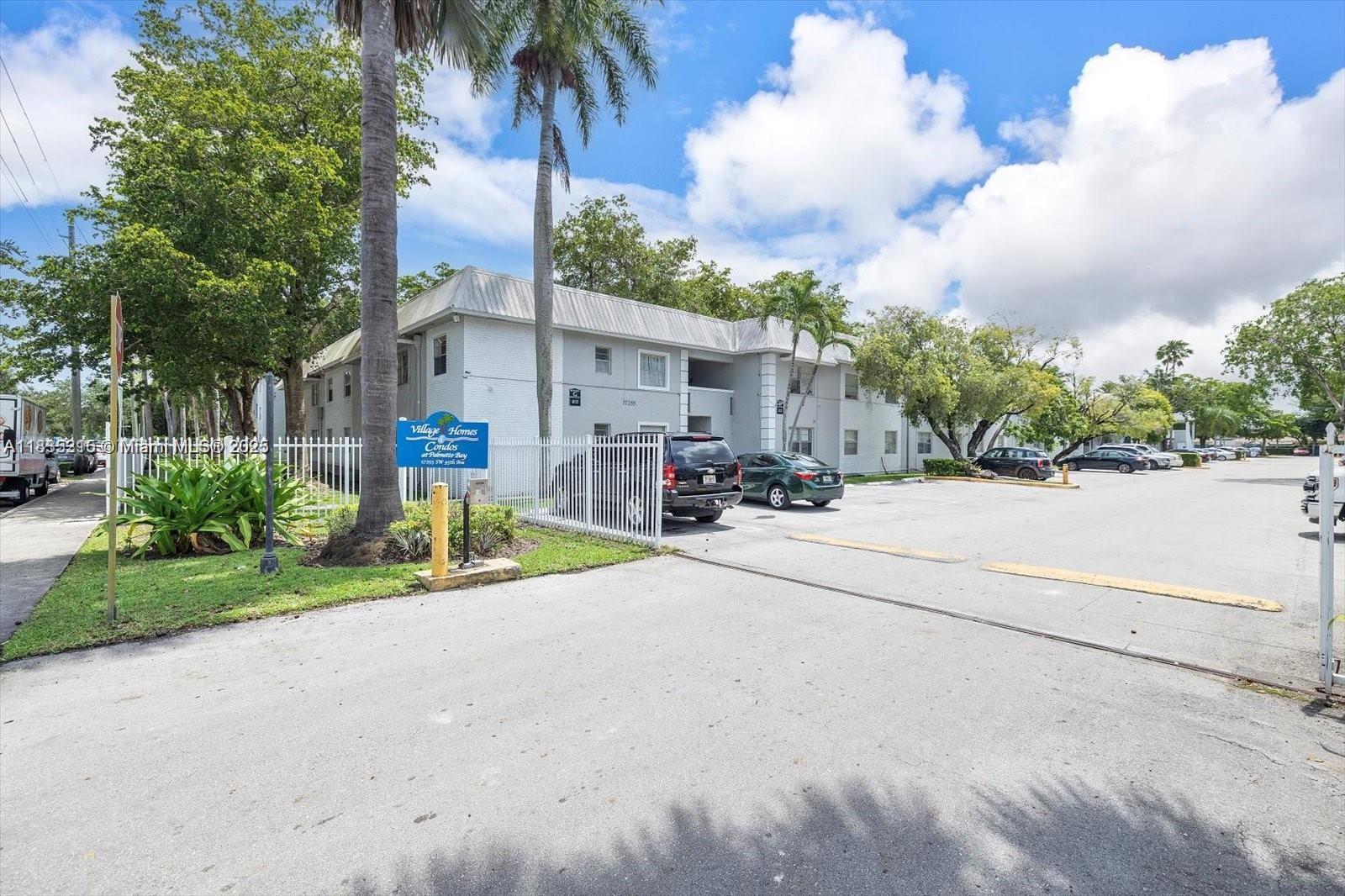 The two-bedroom located in Palmetto Bay. It features two assigned parking spaces, which provide convenient parking options for residents. The kitchen is adorned with granite countertops, and the property is tiled throughout.
