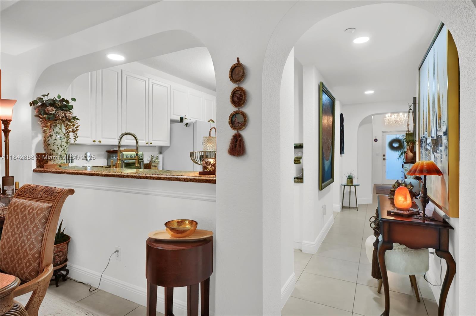 Welcome to this beautifully maintained 2-bedroom, 2-bath residence in Captiva at Doral Isles, one of Doral’s most sought-after gated communities. This bright and inviting home features tile flooring throughout, a spacious master suite with walk-in closets, a large soaking tub, double vanity, and a functional kitchen with ample cabinet space. Enjoy peaceful garden views from your private balcony and unwind in a serene, comfortable living area. Residents of Doral Isles enjoy resort-style amenities including 24-hour gated security, a grand clubhouse, modern gym, multiple pools, hot tub, tennis and basketball courts, soccer field, and scenic lakeside walking trails. Conveniently located near top-rated schools, dining, shopping, and major highways.
