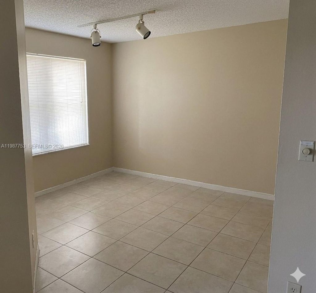 Photo of 1033 Coral Club Dr #1033, Coral Springs, FL 33071 (MLS # A11987753)