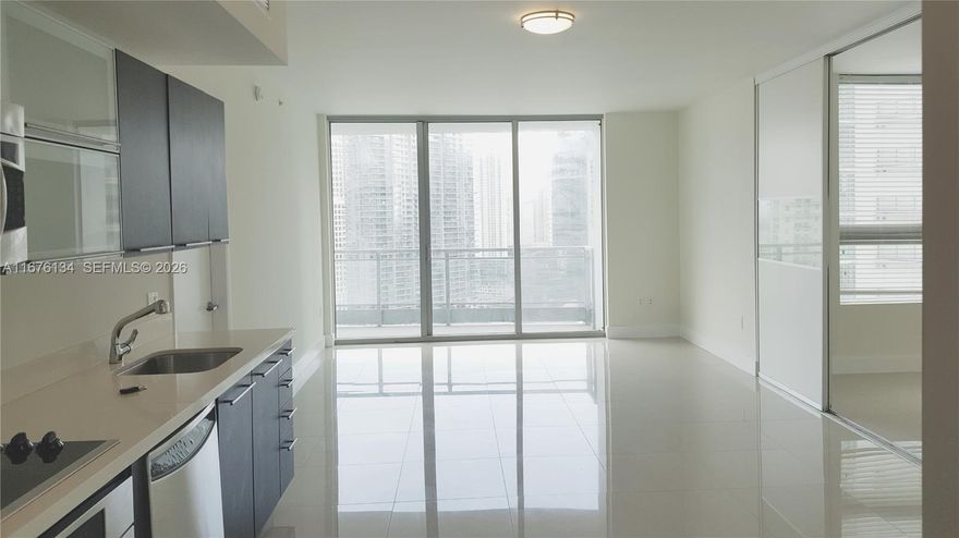 Live in Miami's premier gated in Downtown. This 2 Bedroom, 2 Bathroom boasts breathtaking views of the Brickell Skyline, Miami River, and the ocean. Featuring stainless steel
appliances, an in-unit washer and dryer, new flooring, and a practical split floor plan, this condo ensures both style and comfort. The unit includes one assigned parking space as
well, basic cable, water, and WI-FI, residents enjoy a state-of-the-art fitness center, clubhouse, pool deck, and a luxurious spa, complete with sauna, steam room and massage
rooms. Additional amenities include a dog park, children's playground, an on-site bistro, mini market and dry cleaner. Conveniently located within walking distance of top-tier
restaurants, shopping, and entertainment in Brickell and Downtown.