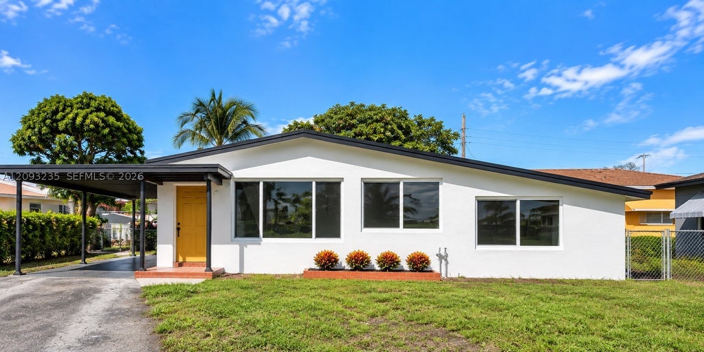 Photo of 1711 NW 26th Ave, Fort Lauderdale, FL 33311 (MLS # A12093235)