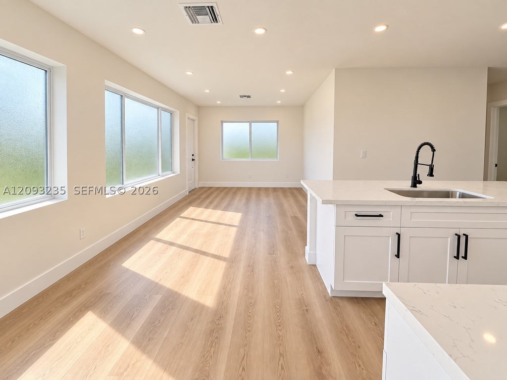 Photo of 1711 NW 26th Ave, Fort Lauderdale, FL 33311 (MLS # A12093235)