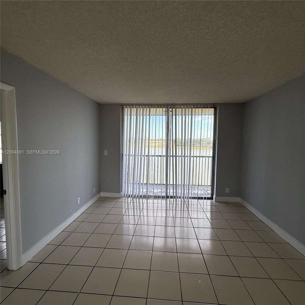 Photo of 8710 N Sherman Cr #305, Miramar, FL 33025 (MLS # A12004091)