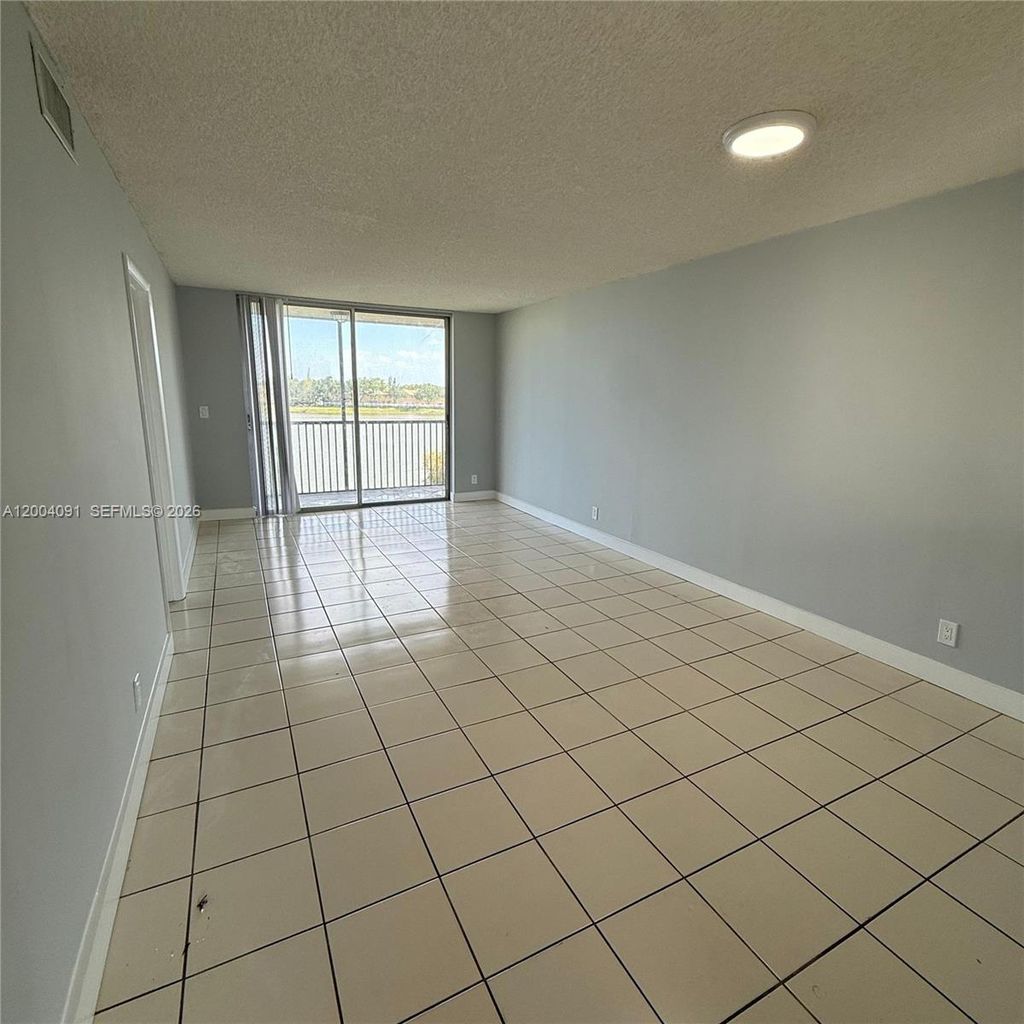 Photo of 8710 N Sherman Cr #305, Miramar, FL 33025 (MLS # A12004091)