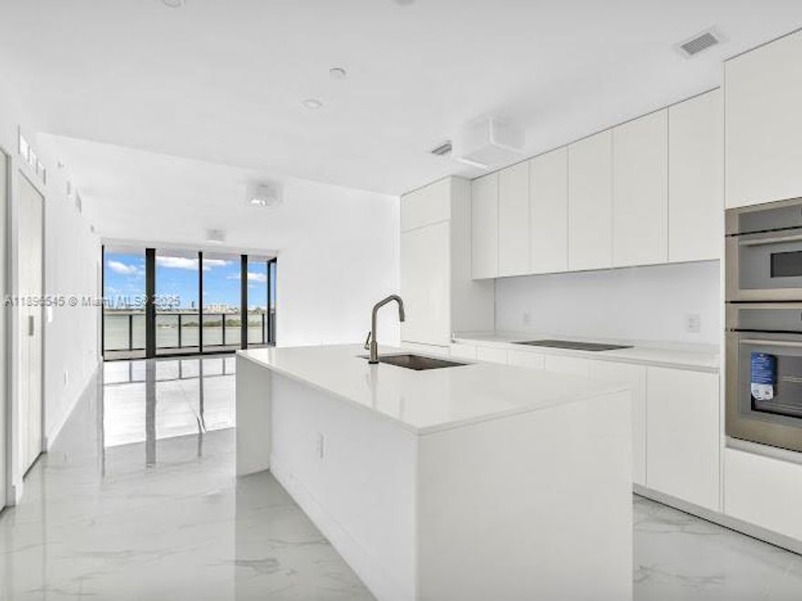 OPPORTUNITY PRICE at Aria Reserve South Tower in Miami’s Edgewater. Brand-new 2-bed + den, 3-bath, 1,783 SF residence in the sky with private elevator access offers seamless indoor-outdoor living and stunning east views of Biscayne Bay sunrises and vivid sunset panoramas. Enjoy 10-ft ceilings, impact glass & designer finishes throughout. The open living area flows to a deep terrace. A gourmet kitchen with Thermador appliances is ideal for entertaining. The primary bedroom features a spa-like bath & walk-in closet. The den offers flexible space for a home office or guest room. Includes 1 Parking Space. Resort-style amenities: bayfront and sunset pools, tennis & pickleball courts,gym, restaurants,kids’ playroom,dog parks, 24/7 concierge. Live where luxury meets the bay.