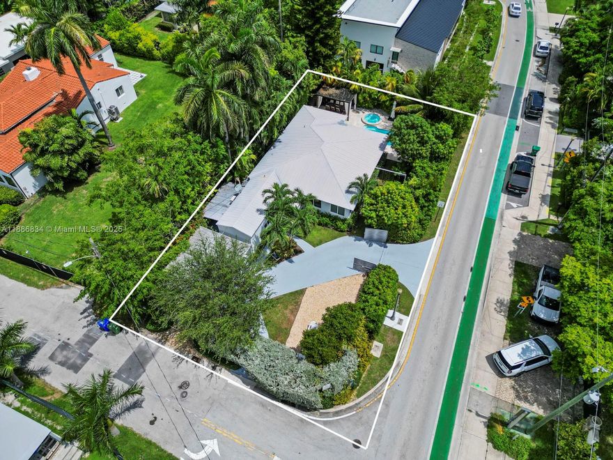 This corner lot property on the Venetian Islands, features 3 bedrooms + Den and 2 bathrooms, along with impact windows, an open kitchen and wood floors. Bright and functional living spaces flow seamlessly to the outdoors, creating the perfect balance. The property is fully gated and surrounded by lush landscaping offering multiple lounging areas throughout the garden, a gazebo, and a private pool with jacuzzi. Only minutes away from the beaches, Sunset Harbour, Lincoln road and top dinning. This home is ideal for those seeking charm, comfort, and an exclusive lifestyle in one of the most desirable areas of the city.