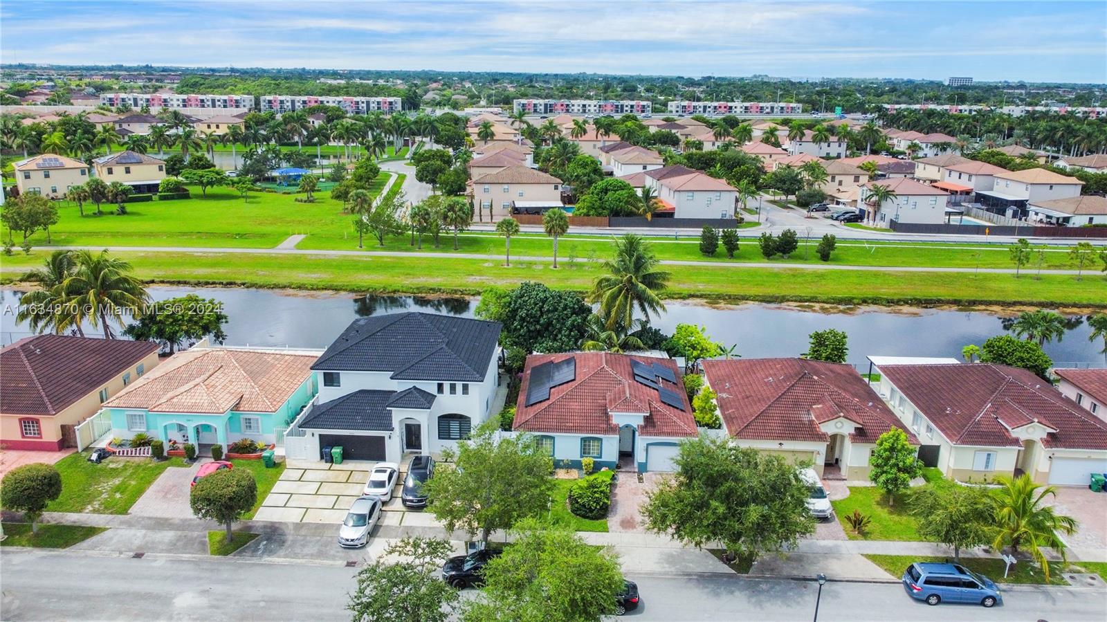 Come and see this beautiful property located in the Riverside Park at Old Cutler Bay neighborhood, beautiful home with 4 bed and 2 bath, close to Florida Turnpike, superstore and to many restaurants. NO HOA, in a great neighborhood. SPACIOUS LIVING AREAS, located in a community with 24-hour security, parking space for 1 car and big guest parking for your visitors. With 1,988 square feet, great value in the zone. This home offers a cozy and welcoming environment for your family and friends with a wonderful view of a back canal where you can enjoy, with a generous amount of space between neighboring residences, ensuring a feeling of openness and privacy. Already with the solar panel system included for a low monthly fee, this home is sold as is. Call before for Showing