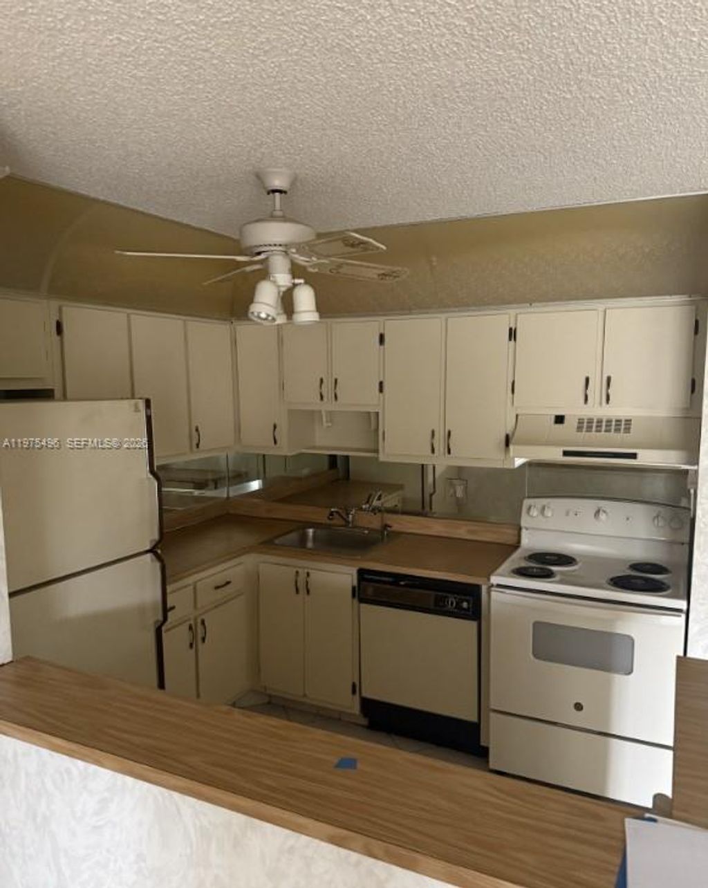 Photo of 10753 W Clairmont Cir #106, Tamarac, FL 33321 (MLS # A11975496)