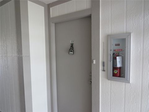 Photo of 10753 W Clairmont Cir #106, Tamarac, FL 33321 (MLS # A11975496)