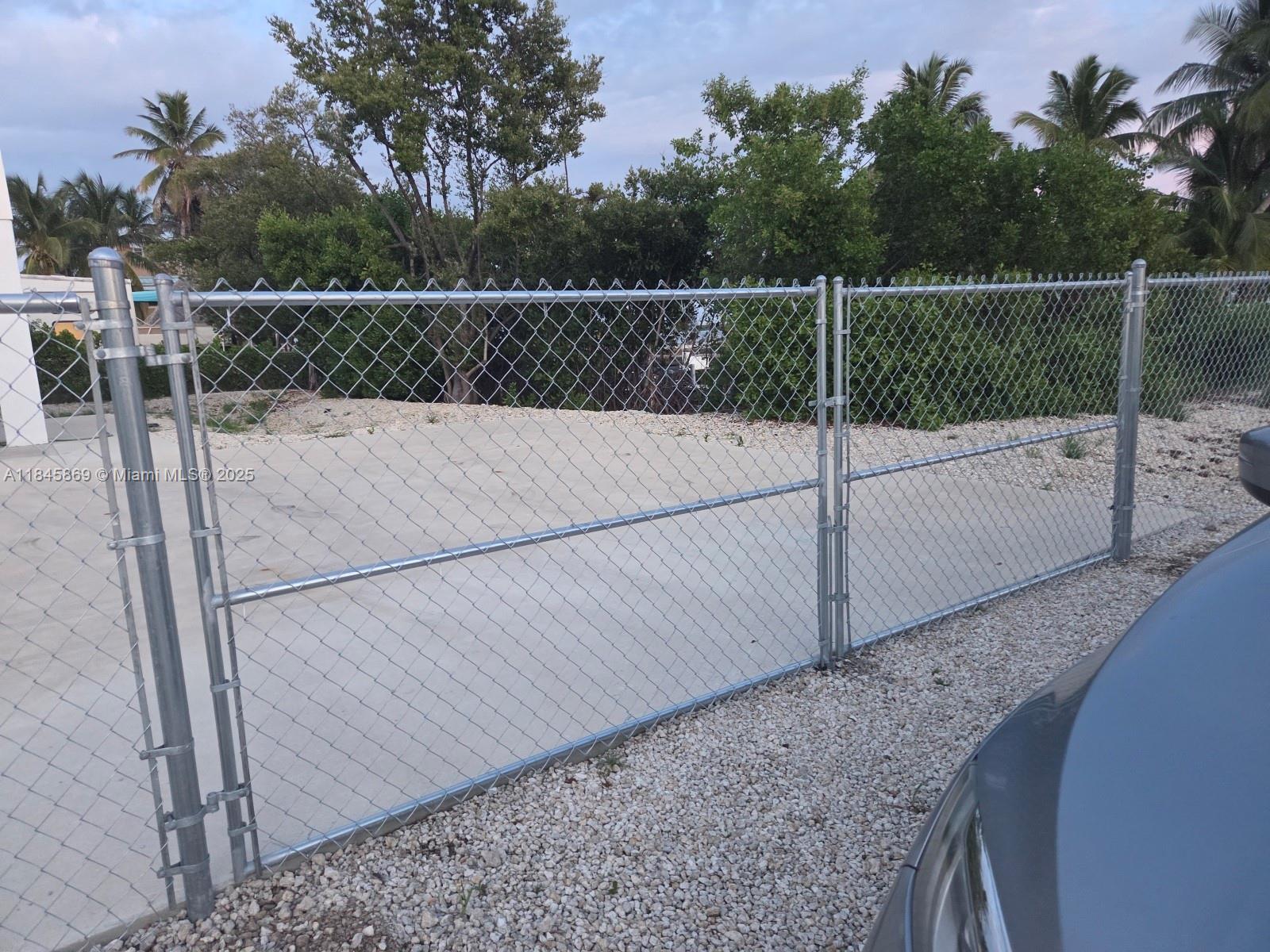 This beautifully maintained, fully fenced 2-bedroom, 2-bathroom single-family home is now available for rent. Featuring all modern appliances and an elevator for easy accessibility, it’s the perfect fit for those with mobility needs. The spacious ground floor offers a relaxing outdoor area, ideal for family barbecues or enjoying sunsets by the peaceful canal that leads directly to the ocean. Full perimeter fence now installed.
Conveniently located near shopping, schools, parks, a public pool, restaurants, marinas, and just minutes away from John Pennekamp State Park, this home puts everything you need within reach.
The listed rate is for a minimum 6-month lease.