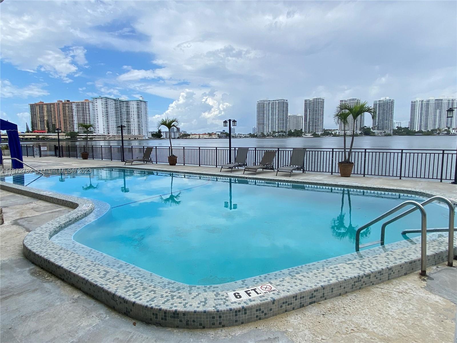 Most desirable building on wide bay Friendly environment best school, parks, shopping, temples churches. Walk to Ocean. This large 1575 sq ft unit offers great panoramic views. Glass sliding floor to ceiling doors, 2 bed 2 baths and office or extra bedroom. Design kitchen of your choice Washer Dryer inside Large closet space 2 car covered spaces Cable TV high speed internet water included in maintenance fee Bayfront heated pool with access to bay for paddle board and small boats. Amenities also include GYM Sauna storage rooms and bike racks
Building has received 40 years Certification from City of Sunny Isles
Beautification project is on the way and expected to be approved soon