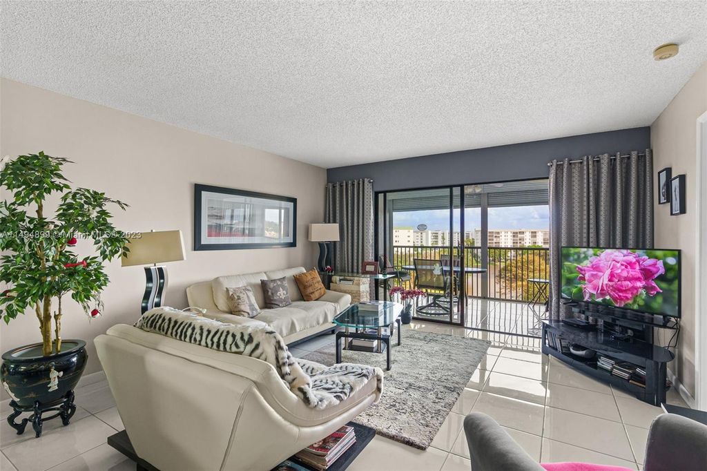Photo of 2334 S Cypress Bend Dr #806, Pompano Beach, FL 33069 (MLS # A11494899)