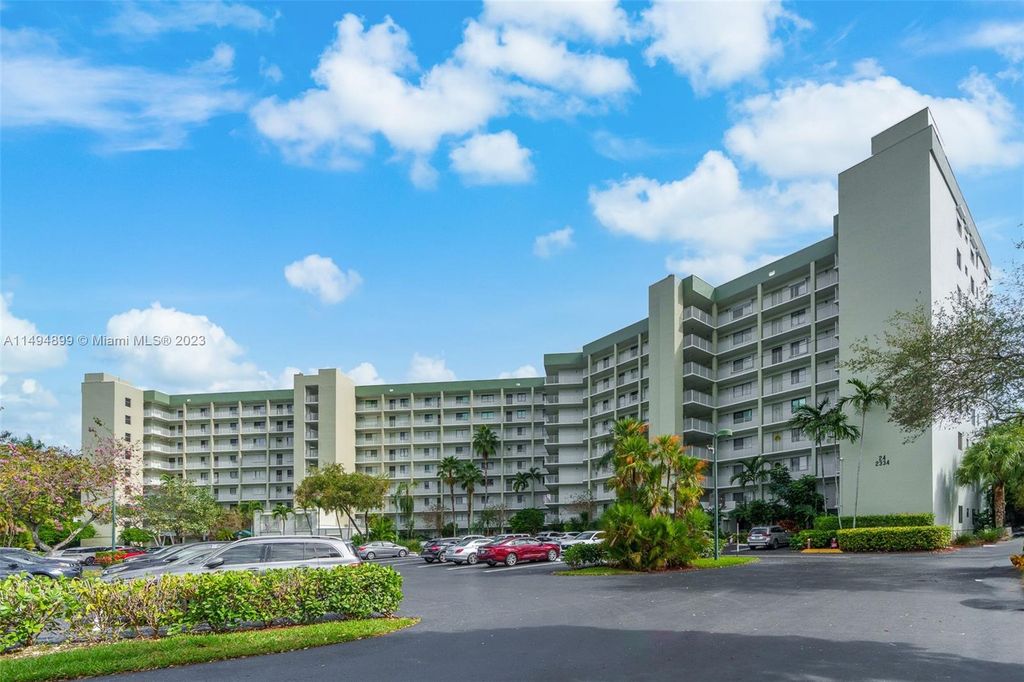 Photo of 2334 S Cypress Bend Dr #806, Pompano Beach, FL 33069 (MLS # A11494899)