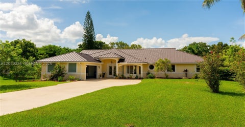 Photo of 20430 SW 53rd Pl, Pembroke Pines, FL 33332 (MLS # A12089334)