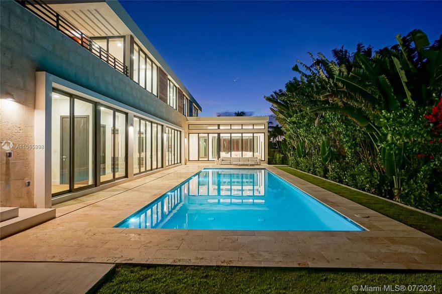 Great opportunity to own this beautiful house, brand new 2021 construction with a unique architecture design. Very bright 5Bed/5.5Baths, seating on a 10,400sqft lot (4,511sqft living area) at prime location in Miami Beach. Ready to move in, this gorgeous 2 floors luxury house features IPE louvers & Claddings in its surroundings mixed with coral stone walls together with an astonishing landscaping. Some indoor fixtures includes mixed wood & porcelain floors, marble tiles in the bathrooms, all around high impact glass doors & windows, Thermador S.S. appliances and custom-made Italian kitchen cabinets, closets and vanities. Enjoy amazing sunset colors everyday displayed facing the Golf Course of Miami Beach as well as the large pool great for family & friends entertainment.