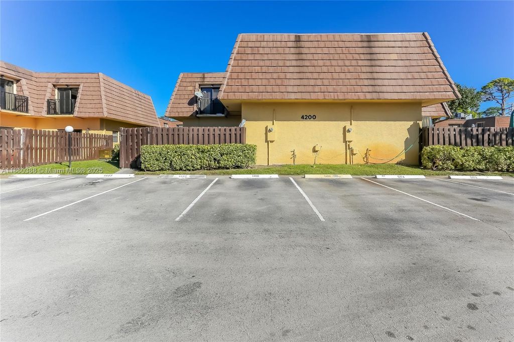 Photo of 4200 Turnberry Cir #1403, Lake Worth, FL 33467 (MLS # A11860388)