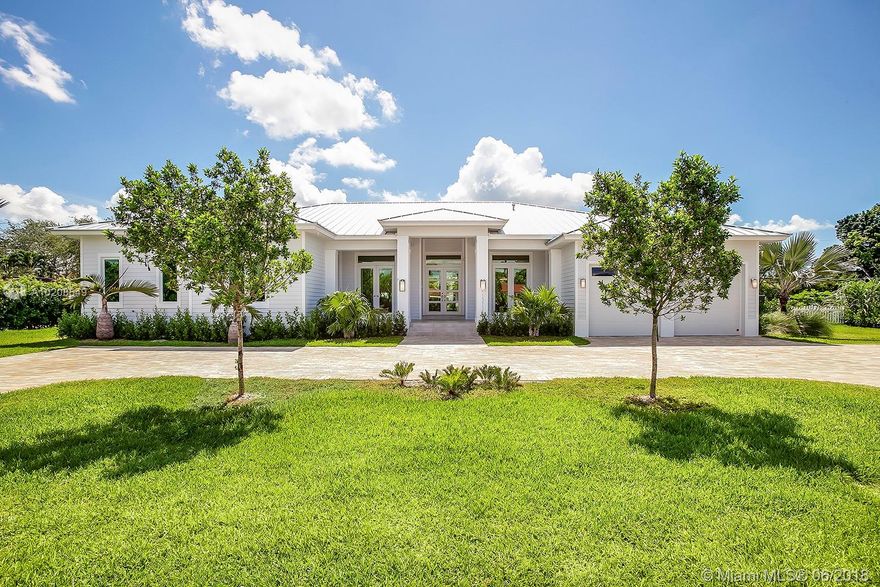 Best New Construction in Palmetto Bay. Soon to be ready-March 2018. Timeless style, thoughtful Key West architecture and enduring quality distinguish this new construction home by legendary Hollub Homes. The beautiful & functional layout merges the indoor & outdoor spaces for seamless entertaining. Features included smart technology, custom kitchen, great room, living room and patio with summer kitchen. Nestled in lovely Palmetto Bay-ideal for families-minutes from top public & private schools, parks, dining and shopping.