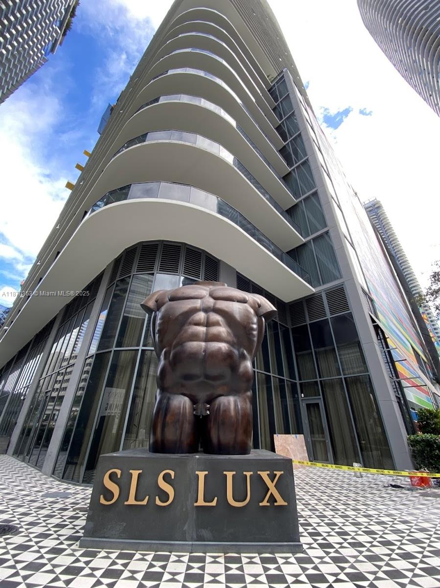 SLS LUX is one of the most luxurious buildings in Brickell, and is conveniently located across from Brickell City Center. This fully furnished unit features a private foyer & 1 bedrooms + Den + 2 bathrooms (Queen Size bed in bedroom + 1 single bed in Den). This residence has porcelain tiled floors; built-in closet cabinets in master bedroom; 9-ft high ceilings w/ floor-to-ceiling windows, contemporary Italian Kitchen cabinets, top of the line appliances & marble bathrooms. Amenities; full-service concierge, valet parking, restaurants, bars, expansive two pools (9th &57th floor) w cabanas & poolside bar, BBQ area, tennis court, gym, spa & much more! Includes1parking space with valet.