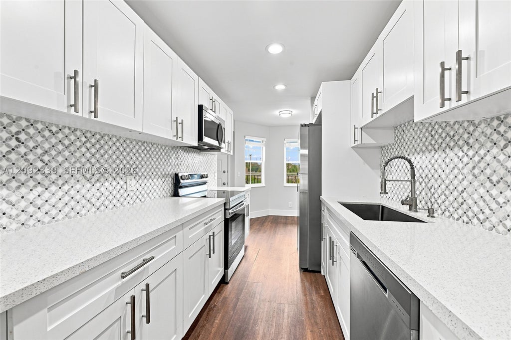 Photo of 1400 SW 124th Ter #202Q, Pembroke Pines, FL 33027 (MLS # A12092339)