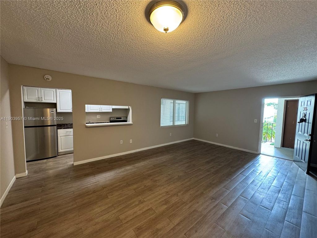 Photo of 3300 S Dixie Hwy #306, Miami, FL 33133 (MLS # A11903957)