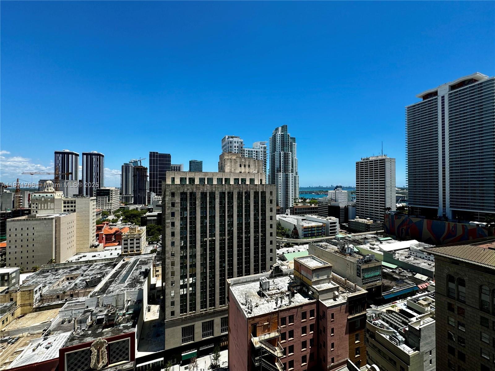 Experience urban living in this chic, fully furnished 1 bed/1 bath loft in Downtown Miami. The open-plan layout boasts an industrial vibe, a modern kitchen with stainless steel appliances, and a cozy bedroom. Enjoy a sleek bathroom, in-unit laundry, and a private balcony with stunning city views. Building amenities include a rooftop pool, fitness center, resident lounge, and 24-hour security. Steps away from dining, shopping, and entertainment. Building does NOT have parking garage. Those with vehicle must pay separately for building valet or off-site parking. Available for 1 year lease only, no short term. Move in requirements: 3 months (1st, last, security) + $1500 Association deposit, ID, credit score & proof of funds. Video tour available upon request.