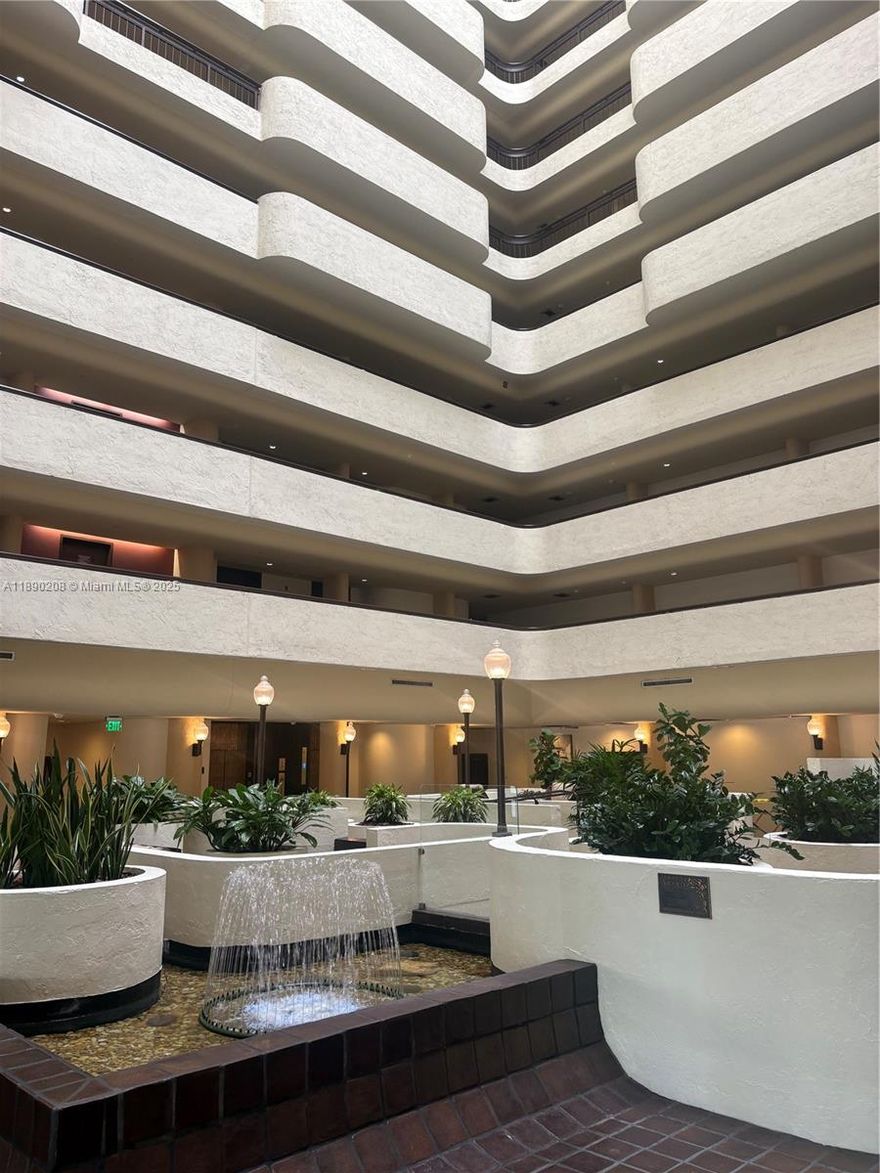 Beautiful condo located in the heart of Coral Gables.  powder room, open balcony with city views