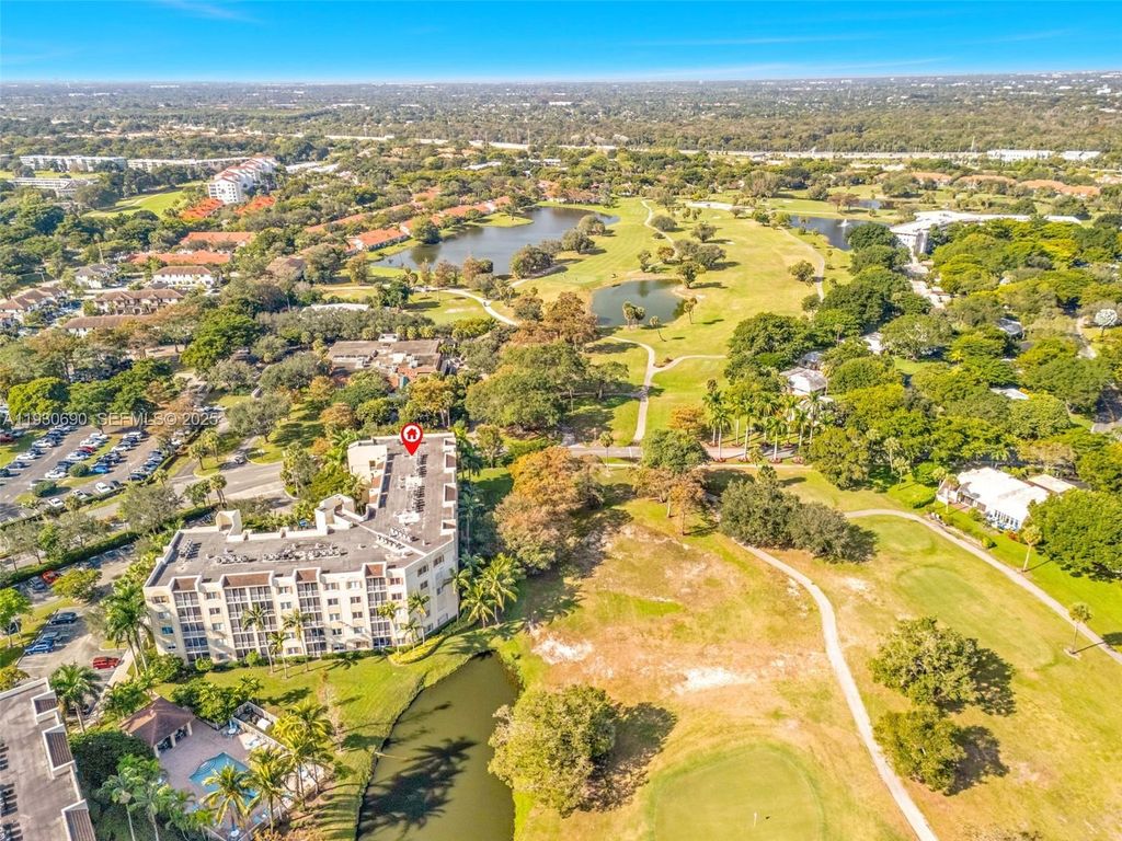 Photo of 3600 Oaks Clubhouse Dr #103, Pompano Beach, FL 33069 (MLS # A11930690)