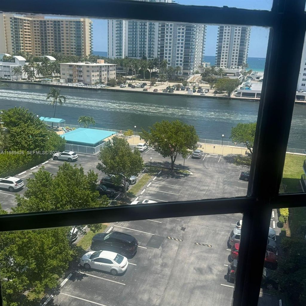Photo of 800 E Parkview Dr #802, Hallandale Beach, FL 33009 (MLS # A11989426)