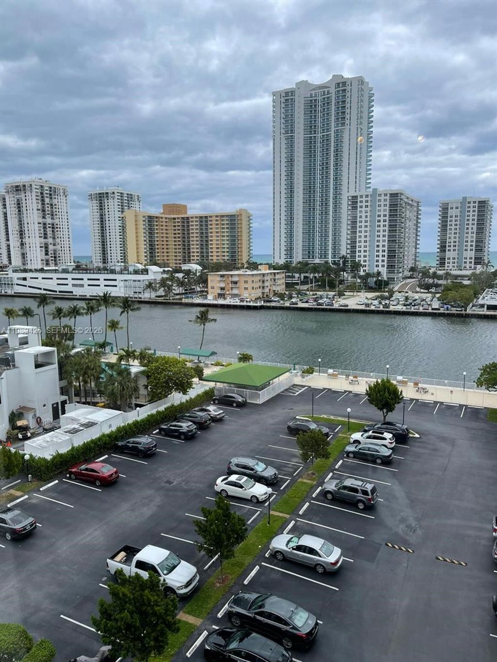 Photo of 800 E Parkview Dr #802, Hallandale Beach, FL 33009 (MLS # A11989426)