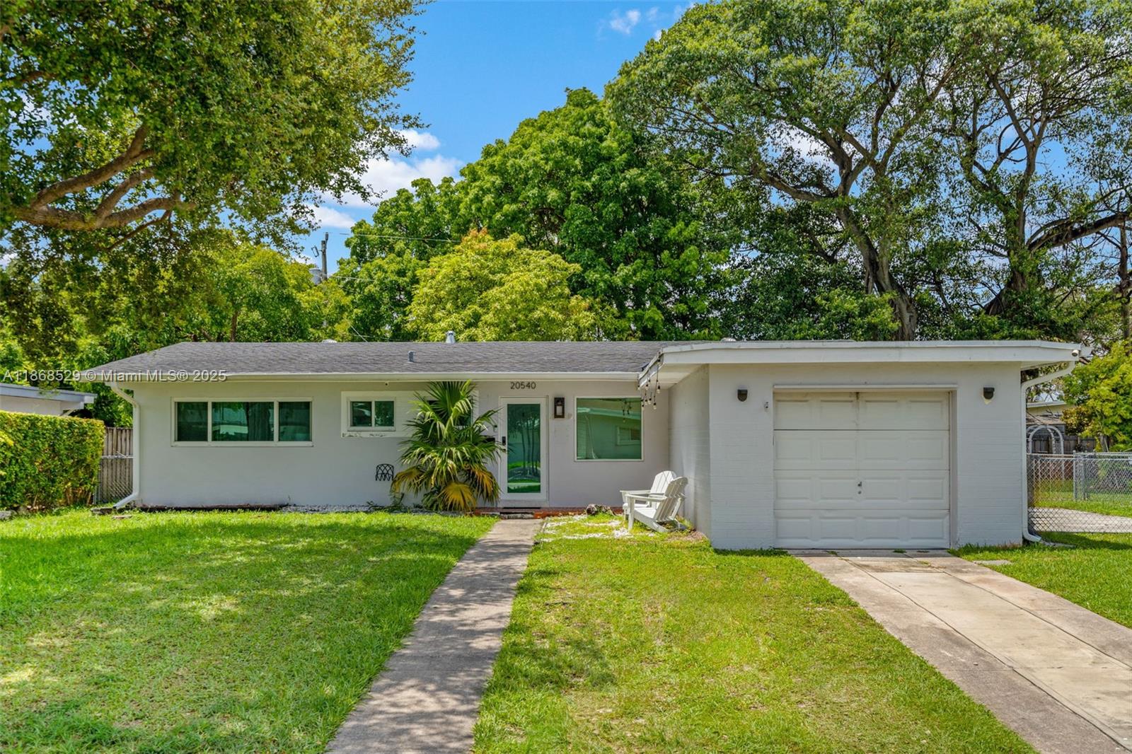 This beautiful Cutler Bay home is the perfect starter home. The 3-bedroom, 2-bathroom layout features a large living room with a wood-burning fireplace and an updated kitchen with granite countertops. Outside, the large, fenced-in backyard is perfect for parking an RV or boat, adding a custom pool, or enjoying the mango tree. The roof was also replaced just two years ago