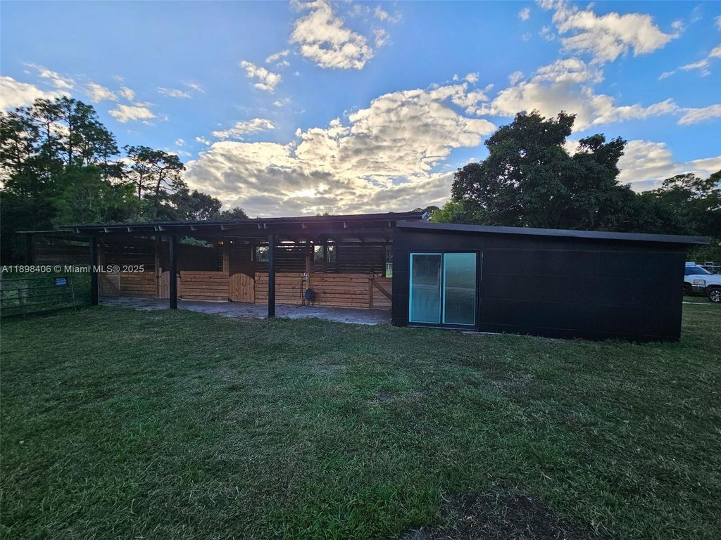 Photo of 15696 Ferris Pl #0, Loxahatchee, FL 33470 (MLS # A11898406)