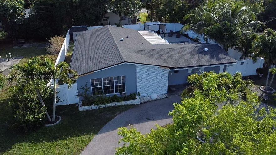 Impeccably upgraded 3BR/2BA entertainment home with BRAND NEW ROOF (Feb 2025), fully renovated POOL (2023—new plumbing, electric & resurfacing), & circular driveway (refinished 2022), offered tastefully FURNISHED. Enclosed by 6-ft PVC privacy fence, Backyard Oasis features 30-ft covered outdoor living/dining area; sealed, 2-tier wood deck (reinforced for future jacuzzi) with shaded Pergola, & BBQ patio. Pool access from living room, guest bath & primary. Open living/dining, bright kitchen, stainless appliances, impact windows/doors, tankless water heater, central AC (2019), indoor laundry. Washer/dryer, outdoor shed convey. Roof & pool warranties are transferable.
