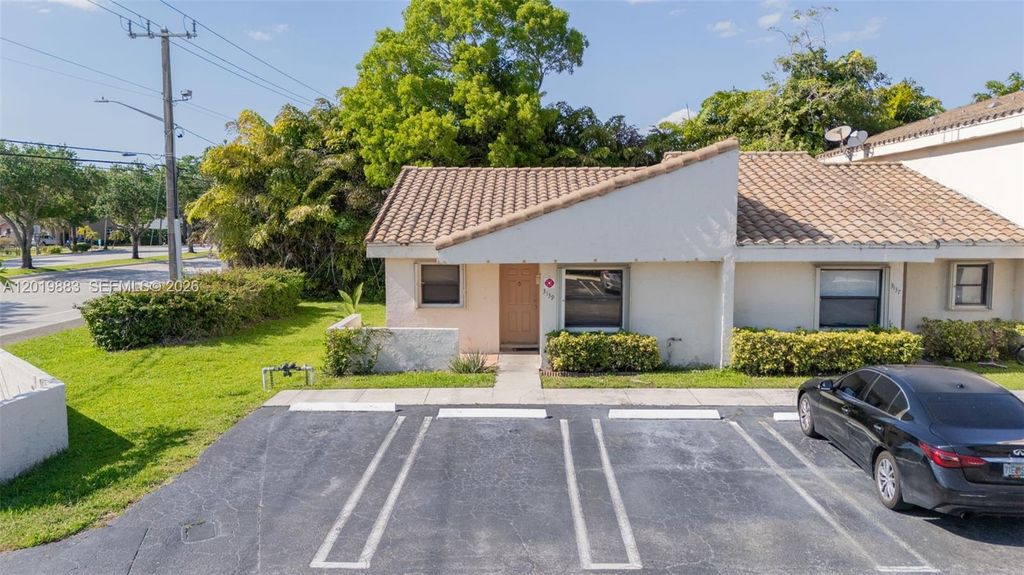 Photo of 3139 Coral Ridge Dr #3139, Coral Springs, FL 33065 (MLS # A12019883)