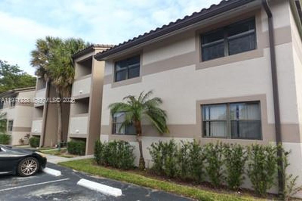 Photo of 9785 Nob Hill Ct #9785, Sunrise, FL 33351 (MLS # A11971238)