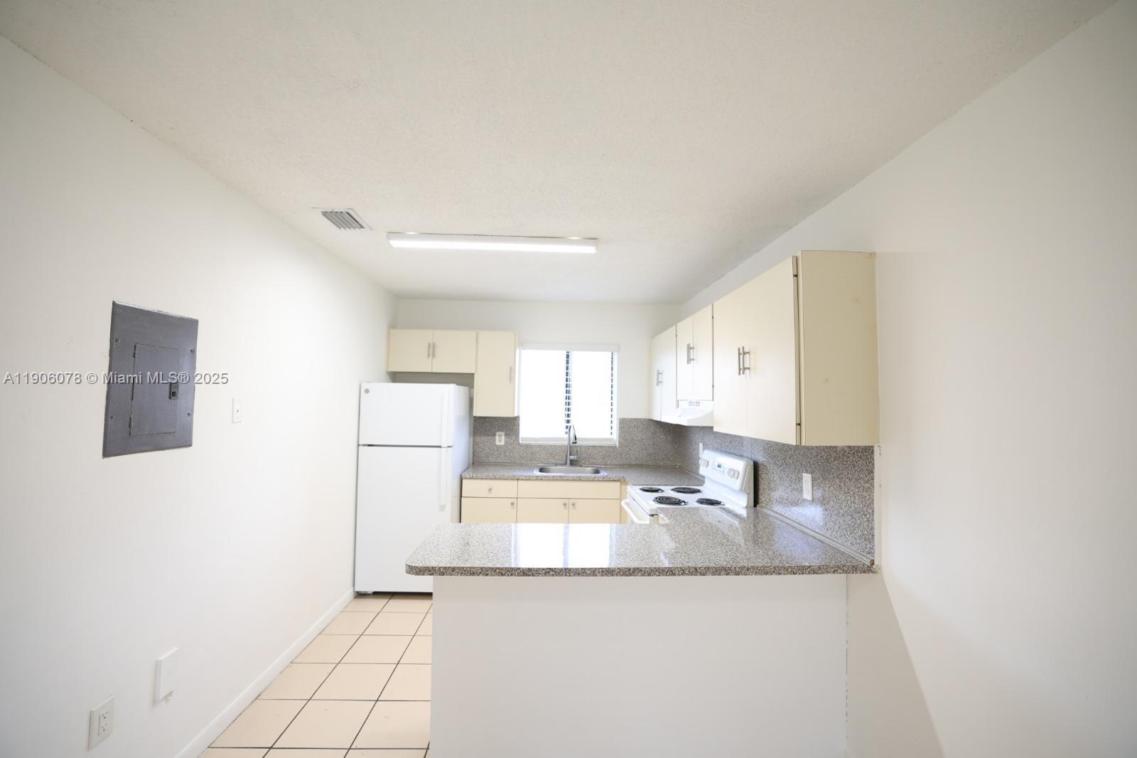 RAPID APPROVAL!! 2 bedroom, 1 bathroom and hall bath included. Located in the heart of Hialeah! This ample apartment features tile flooring, freshly painted walls and open kitchen. 2 parking spots included. Minutes away from shopping plazas and major highways. Washer/dryer room separately available on premises. $25 additional monthly pet fee for small breed only.