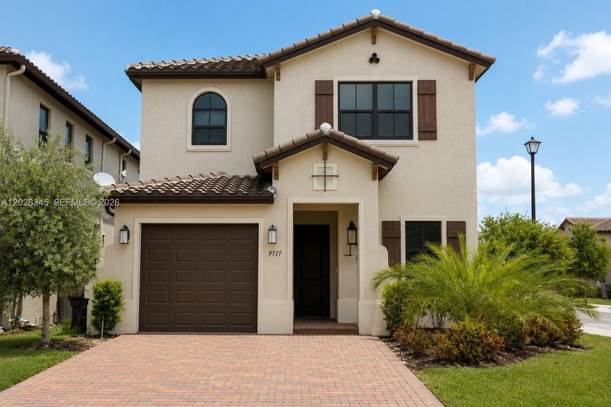Welcome to Bonterra! This beautifully maintained corner-lot home offers 4 bedrooms and 3.5 bathrooms with a highly desirable floor plan featuring two primary suites, one on each level. The first floor includes a full ensuite bedroom, while the upstairs primary suite features dual vanities, a private toilet room, separate shower, and a large soaking tub.

Upstairs, the oversized second bedroom was expanded by enclosing the original loft area and now includes a dedicated sitting area, office space, and built-in library. Built-in closet systems are featured throughout the home.

Bright and spacious interiors showcase soaring ceilings, abundant natural light, tile flooring on the first floor, and light gray wood-look laminate flooring throughout the second level. The gourmet kitchen features granite countertops, stainless steel appliances, ample cabinetry, and a reverse osmosis drinking water system. Additional upgrades include a whole-house water treatment and water softener system.

Enjoy resort-style amenities including a clubhouse, fitness center, and swimming pool, all within a secure gated community. Conveniently located near major highways, Miami International Airport, shopping, dining. A fantastic opportunity in one of Northwest Miami-Dade’s most desirable communities.

Virtual Staging Disclosure: Some photographs have been virtually staged. Furniture and décor shown are for illustrative purposes only and are not included in the sale.