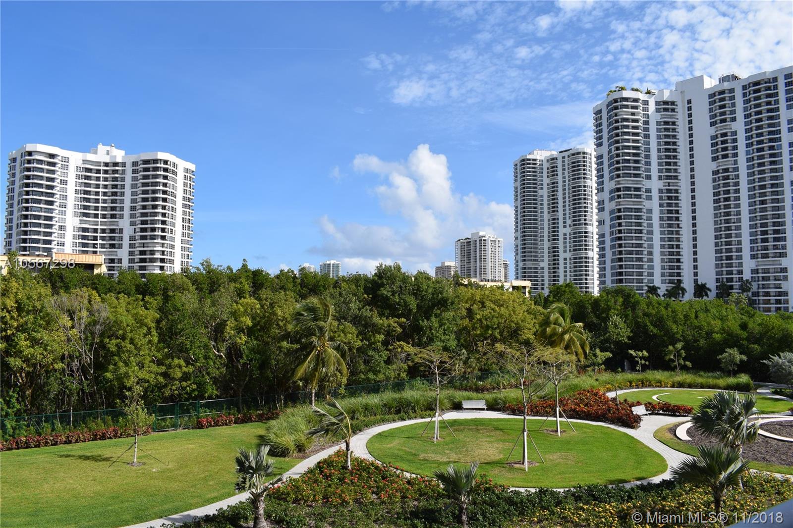 Stunning 2 bedrooms/2.5 bathrooms with an upgraded kitchen, bathrooms and porcelain floors. Community features marina landscape, 2 pools, club house, 6 tennis courts, gym/spa with an amazing view. Building lobby and amenities, walking distance to shopping, parks, A+ schools, malls and restaurants. Pet friendly building. Feels like you are floating as soon as you get inside this gorgeous unit.