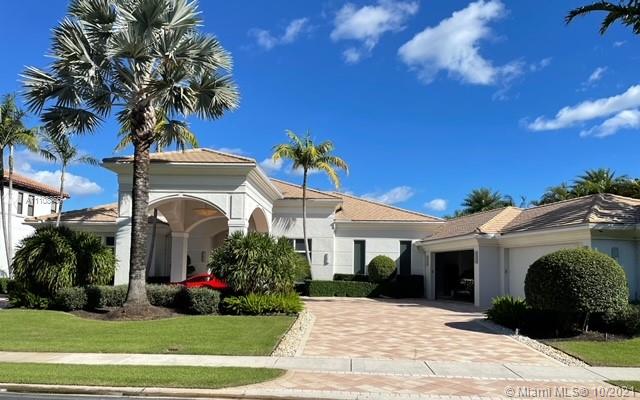 Magnificent Custom 4 BR 5.1 BA Home in prestigious Frenchmans Reserve Country Club on lake and golf view lot.
Luxuriously appointed for the most discerning buyer.