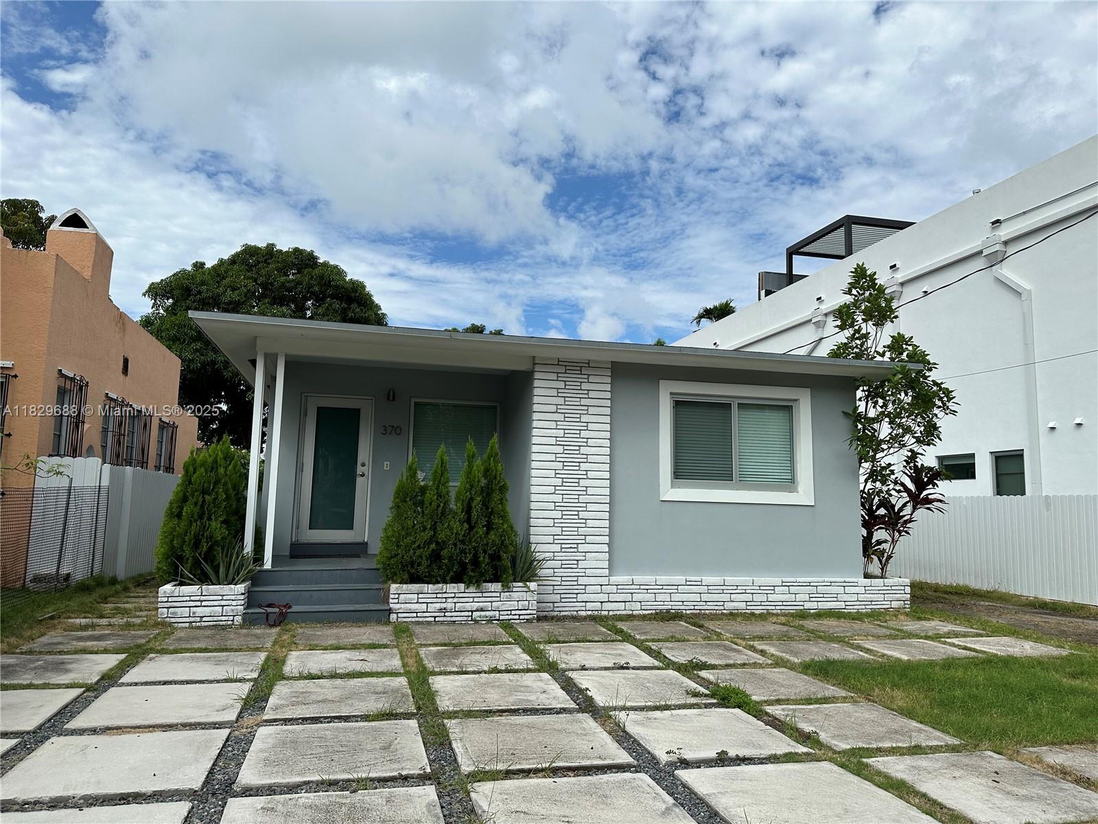 Remodeled modern duplex in centrally located "The Roads". This is a beautiful residential area in the heart of the city of Miami. Close to expressways, wonderful schools, supermarkets, Brickell area, and more. Spacious, fully renovated with private courtyard, deck and grill area. Large kitchen with beautiful cabinets. Open plan kitchen, living and dining room. Spacious bedrooms with built-in closets, gorgeous bathrooms. Secured top-quality impact windows and doors. Internal laundry. Conveniently located close to a park. Wonderful yard. Great schools.