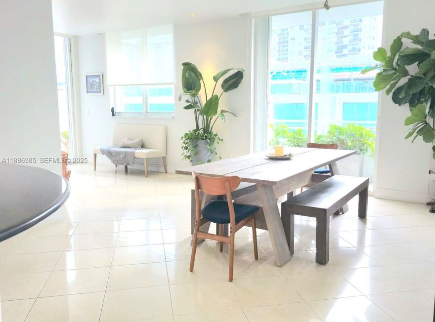 Miami Beach PH in front of the ocean in a modern boutique building. This east-facing 2 bed/2 bath  residence offers a massive private rooftop terrace, three balconies, high ceilings, impact windows, tile floors, spacious closets, custom window treatments, and an open kitchen. Nautica is a pet-friendly, 33-unit condo built in 2004, recently renovated with a new lobby. Amenities include a private rooftop pool with panoramic views, a fitness center, private boat slips on Indian Creek, and two elevators. Ideally located near supermarkets, restaurants, shopping, schools, golf courses, a rowing club, and Mt. Sinai Hospital. Includes a parking space with an electric car charger. Don't miss this unique opportunity. PLEASE ENJOY THE VIRTUAL TOUR OF THE BROKERS' REMARKS.