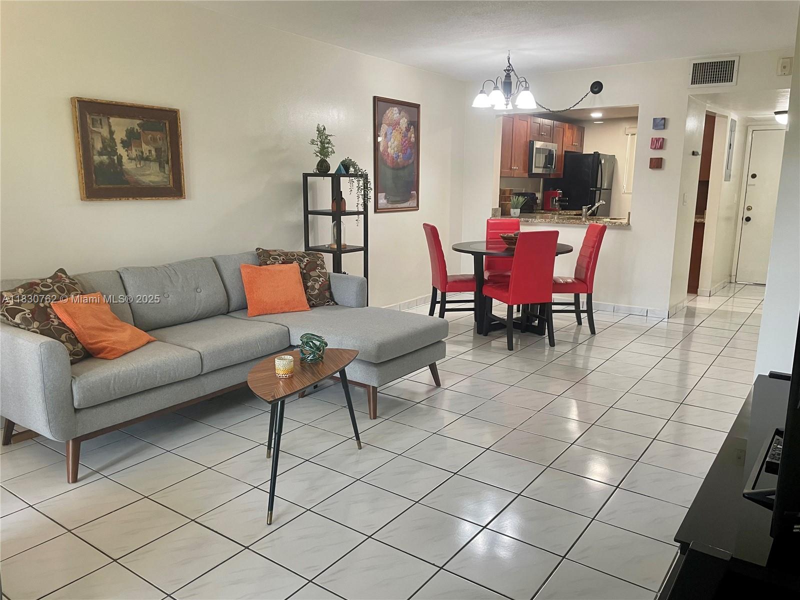 Amazing corner unit, 2 bedroom 2 bath apartment with lake views, no neighbors on the back yard ;) New AC and water heater - 2022. New electrical panel - 2024, New appliances 2022. Shutter in all windows and doors. Come and enjoy this great location, lots of commerce around. HOA include trash, security, gardening and cleaning of the common areas, club house and 3 pools. On Supra