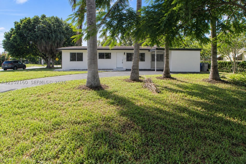 Photo of 1201 NE 26th Ter, Pompano Beach, FL 33062 (MLS # A12102160)