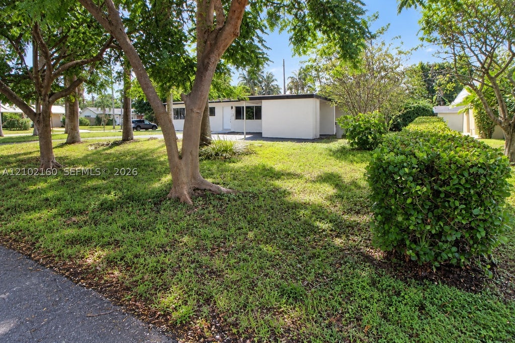 Photo of 1201 NE 26th Ter, Pompano Beach, FL 33062 (MLS # A12102160)