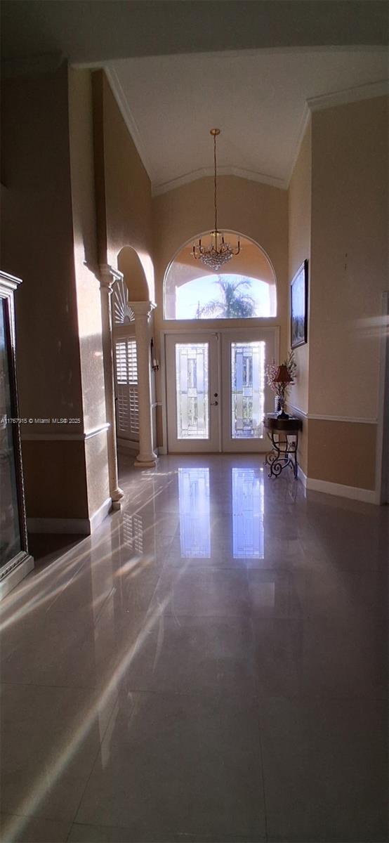 ST. LUCIE WEST ASSUMABLE MTG @3.5% By Clover Park, shops & Indian River College 3-bedrm, plus Den 2-bath, 2-car garage home w/countless upgrades! This property is sure to impress.Master suite offers a luxurious walk-in shower with dual shower heads, jacuzzi tub, double sinks, & spacious walk-in closet, plus direct access to a serene backyard patio. The home features a cooking island kitchen, a central vacuum system, a propane generator, and a fully tiled garage w/mini-split AC, full wall storage cabinets, a workbench station, pull-down attic stairs with ample storage space. The property boasts a well irrigation system & offers stunning views of a grassland retention pond, creating a peaceful bird preserve atmosphere. Ceramic tile flooring throughout, this home is truly a hidden gem!